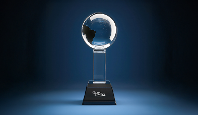 Crystal globe trophy on black base against dark blue background.