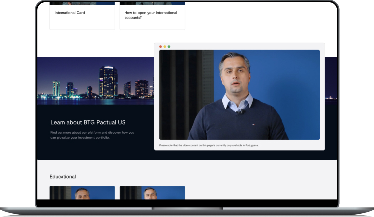 Notebook with open screen showing BTG Pactual videos
