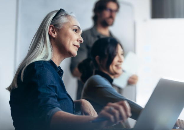 Three people working